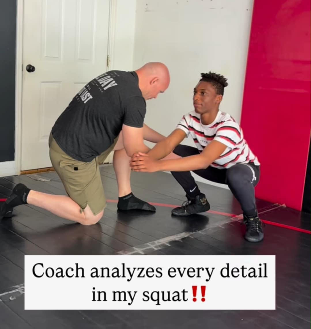 Coach Dane working 1-on-1 with an athlete