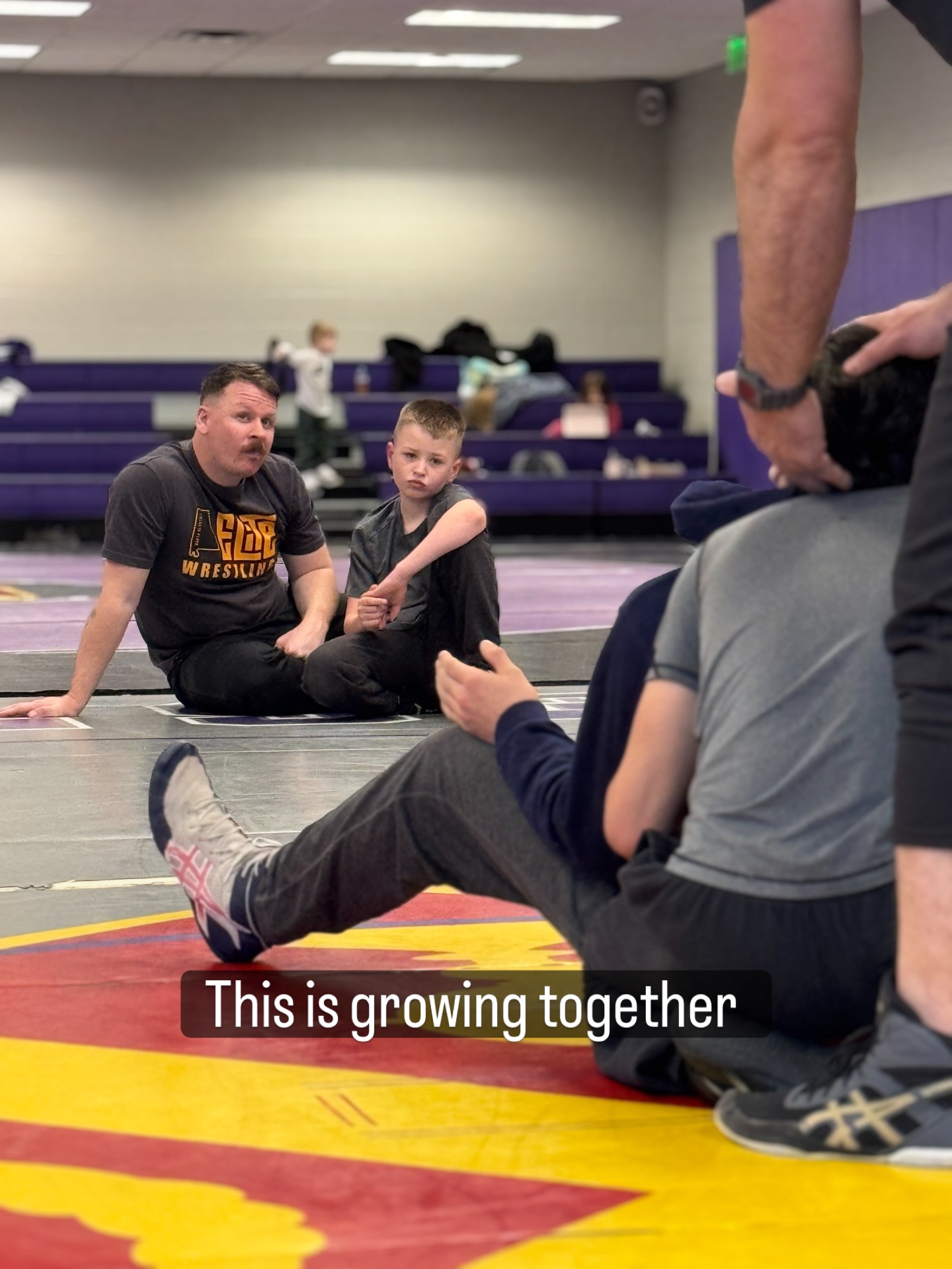 Father and son training together at camp